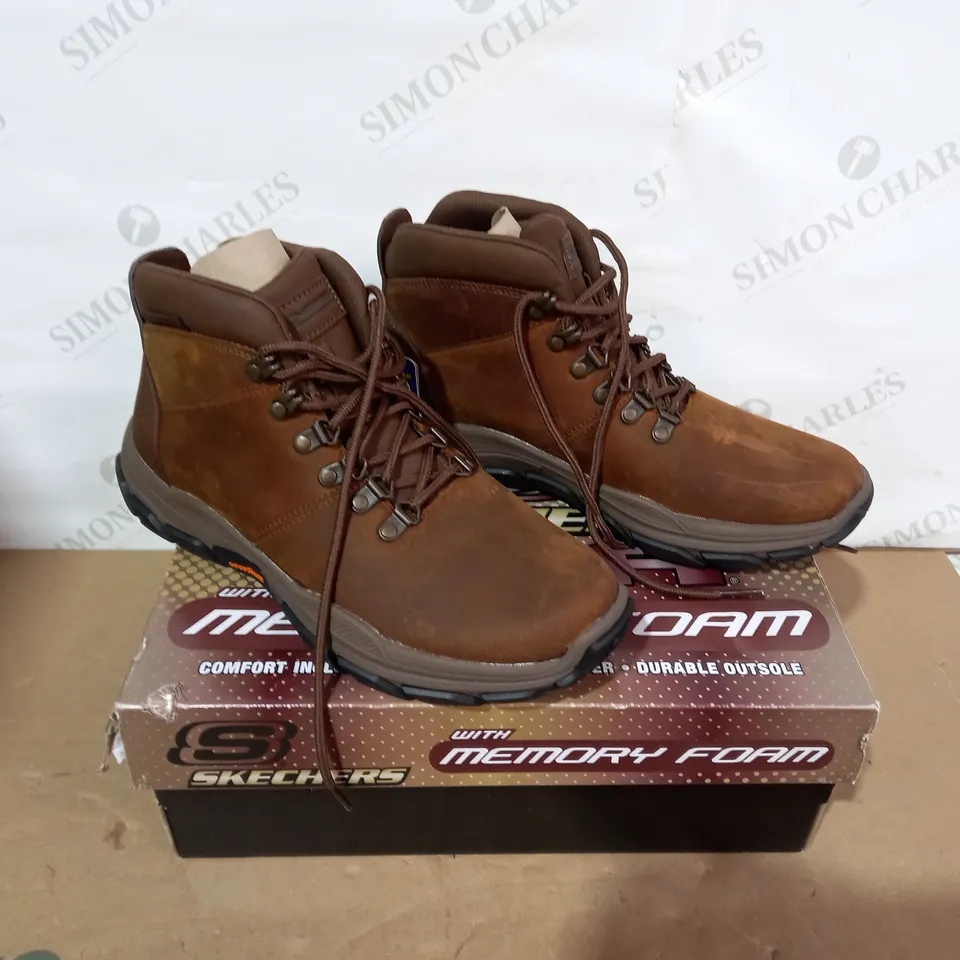 BOXED PAIR OF SKECHERS BROWN BOOTS- SIZE 7