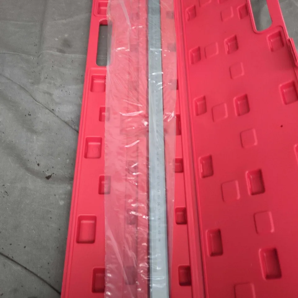 STAINLESS STEEL RULER IN PINK PLASTIC CARRYING CASE