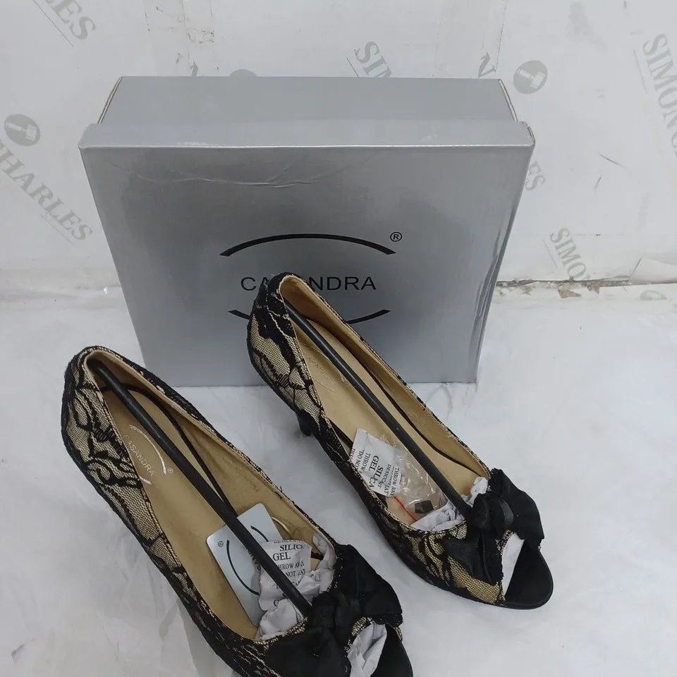 LARGE BOX OF BOXED APPROXIMATELY 10 CASSANDRA OPEN TOE HEELS IN BLACK/SAND IN VARIOUS SIZES