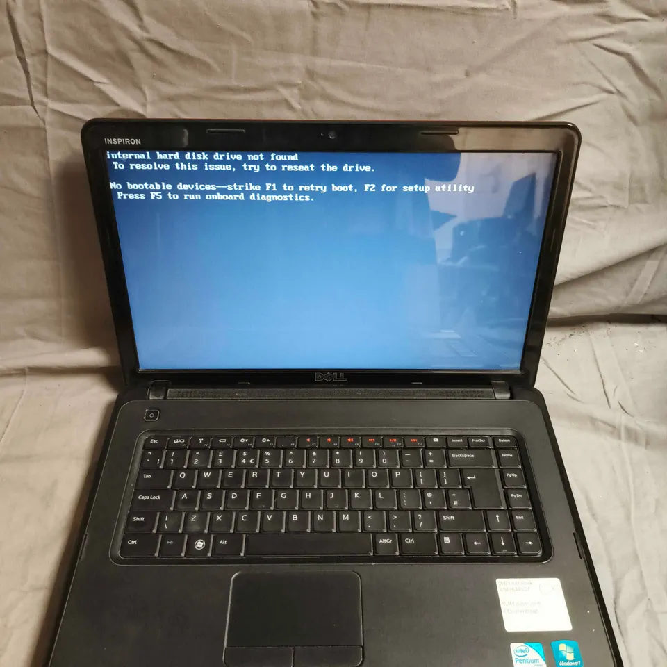 DELL INSPIRON LAPTOP – BLACK CHASSIS (LID MAY APPEAR RED IN LIGHTING)