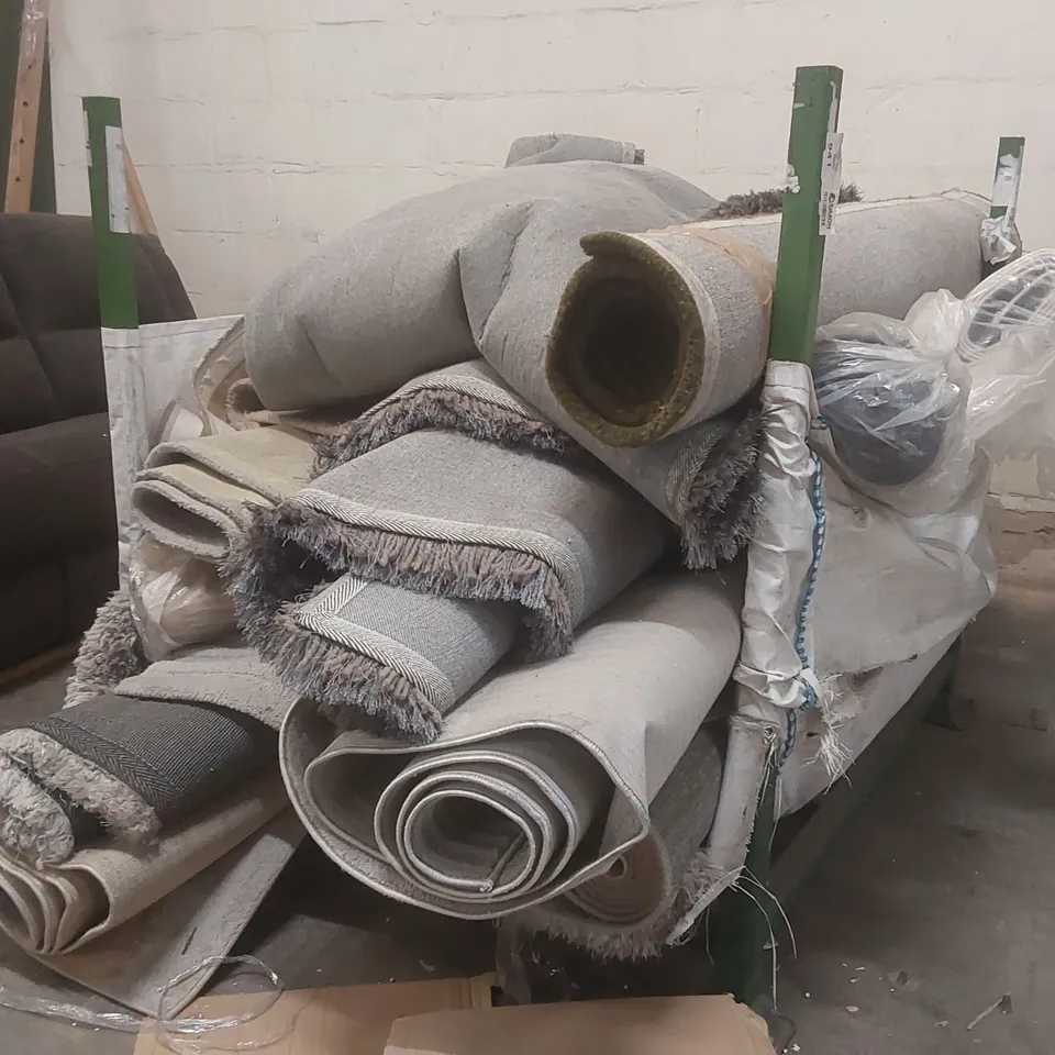 STILLAGE CONTAINING A VERY LARGE QUANTITY OF ASSORTED DESIGNER RUGS // STILLAGE NOT INCLUDED