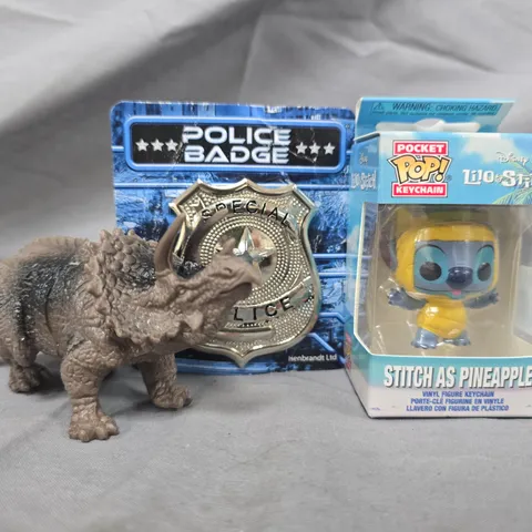 APPROXIMATELY 10 ASSORTED TOYS AND GAMES TO INCLUDE POCKET POP KEYCHAIN, POLICE BADGE, ETC