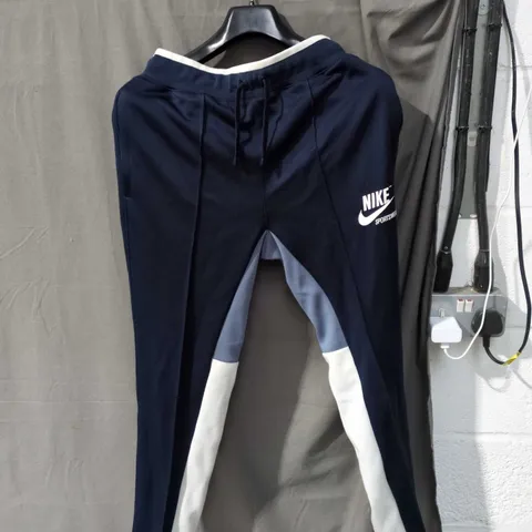 NIKE SPORTSWEAR TRACK PANTS - NAVY WITH LIGHT BLUE PANELS - SIZE XS
