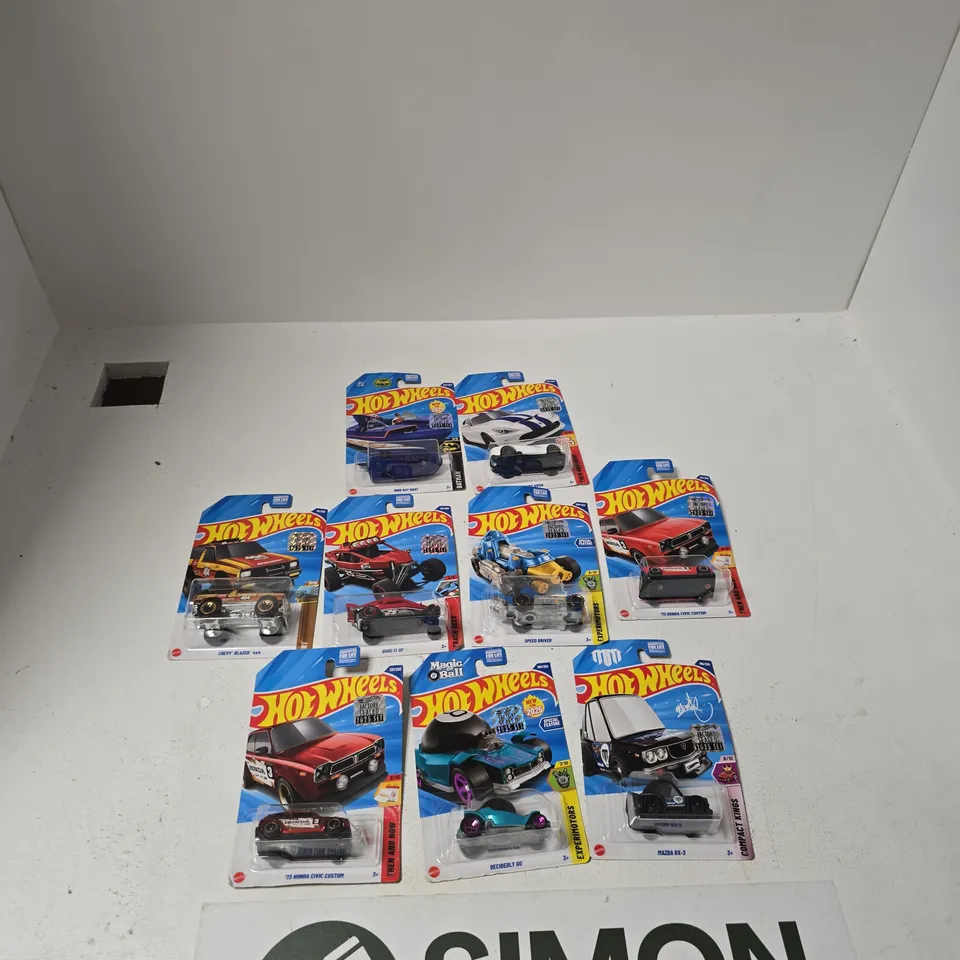 APPROXIMATELY 9 X HOT WHEELS – ASSORTED SCALE DIE-CAST CARS IN BLISTER-PACK PACKAGING