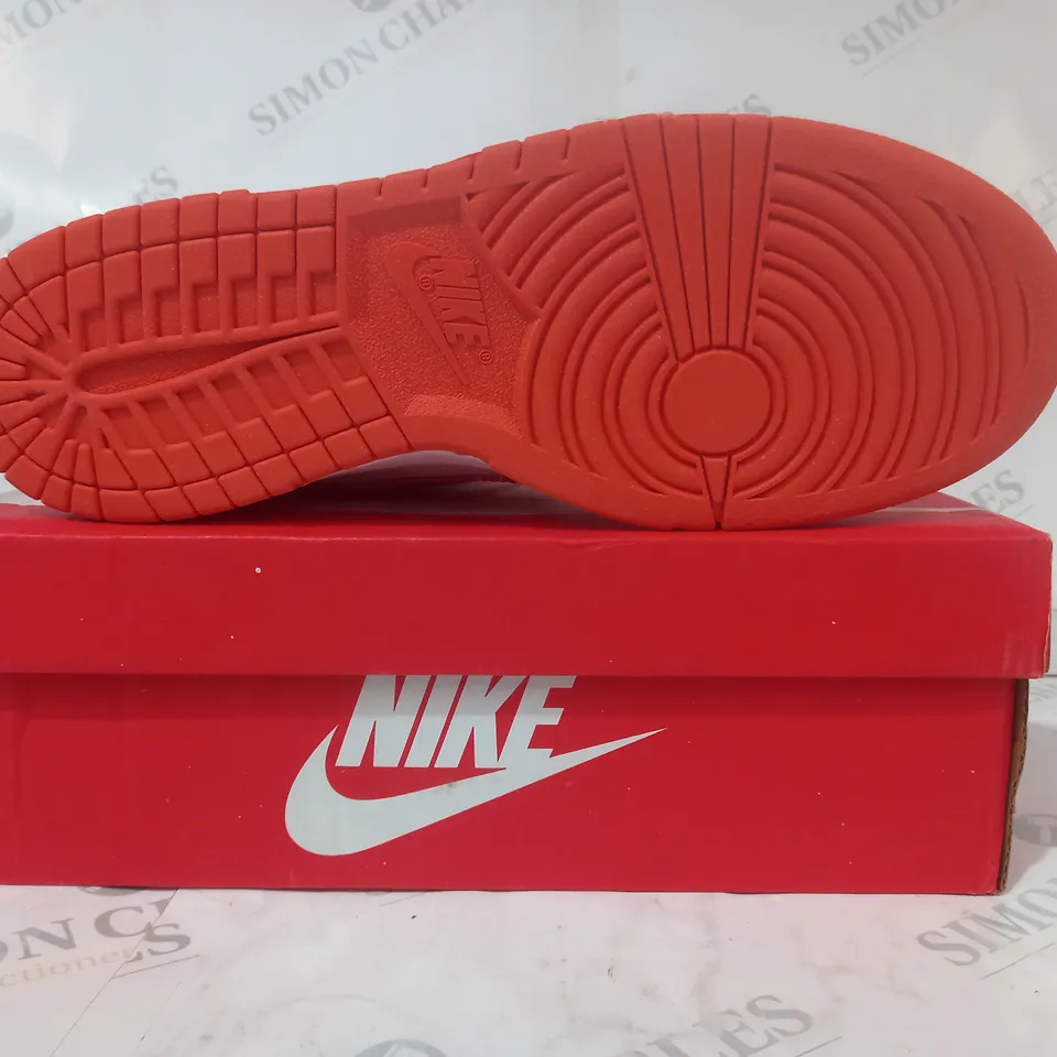 BOXED PAIR OF NIKE SB DUNK LOW PRO SHOES IN ORANGE/WHITE UK SIZE 11