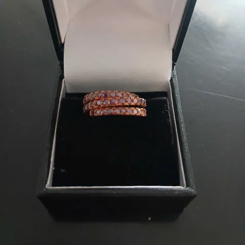 9CT ROSE GOLD WRAP AROUND RING WITH MULTIPLE STONES