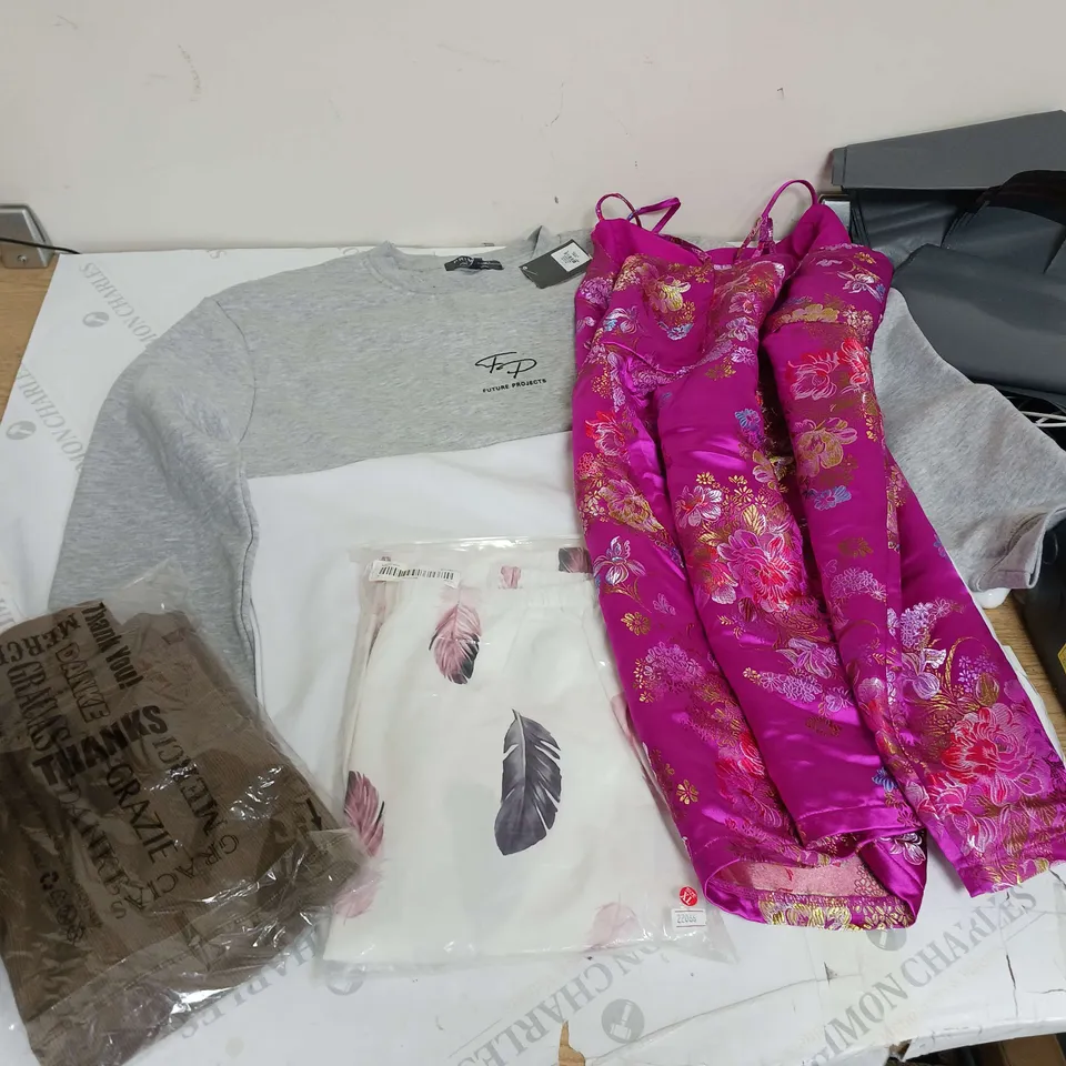 LARGE BOX OF ASSORTED CLOTHING ITEMS IN VARIOUS COLOURS AND SIZES INCLUDING TROUSERS , TOPS AND JUMPERS 