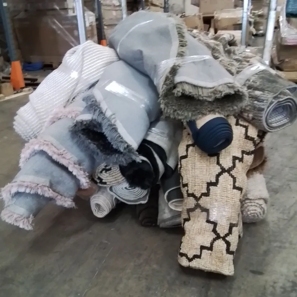 STILLAGE OF APPROXIMATELY 15 QUALITY DESIGNER RUGS