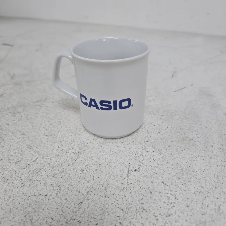 BOX OF APPROXIMATELY 20 ASSORTED HOUSEHOLD ITEMS INCLUDING CASIO MUG AND DROPS BRUSHED ALPACA SILK