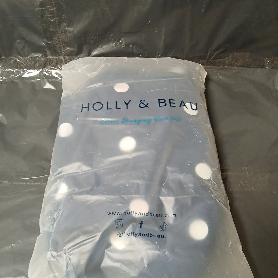 HOLLY & BEAU SPOT COLOUR CHANGING RAINCOAT – XS – BLUE WITH WHITE POLKA DOTS