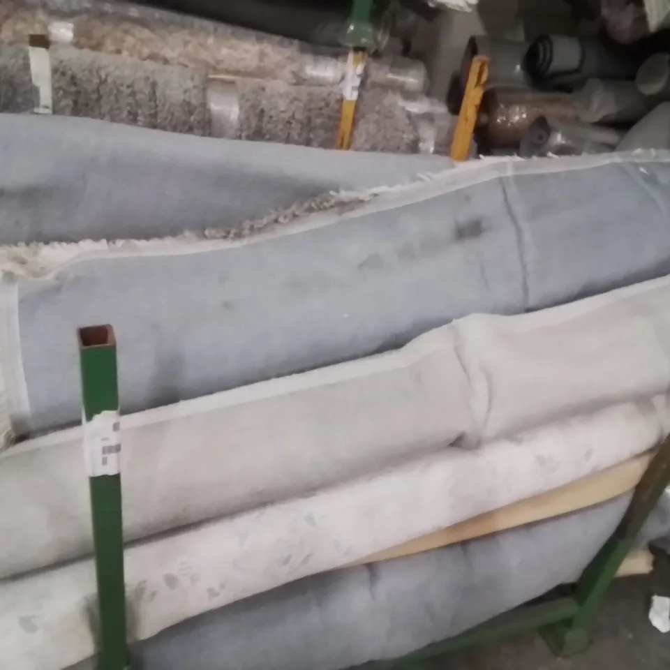 STILLAGE OF QUALITY DESIGNER RUGS APPROXIMATELY 15