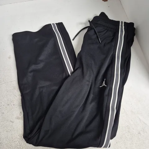 NIKE JORDAN SIDE STRIPE TRACKSUIT BOTTOMS IN BLACK