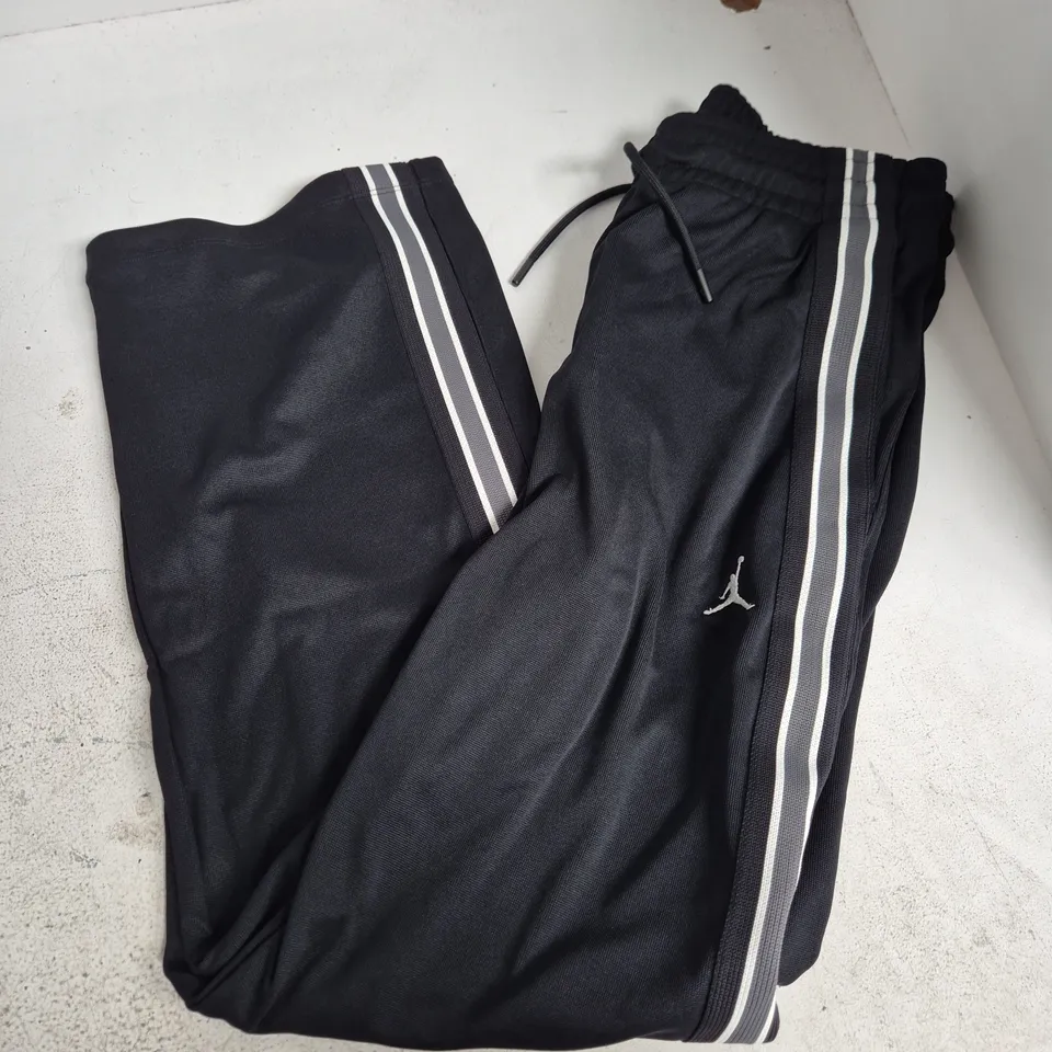 NIKE JORDAN SIDE STRIPE TRACKSUIT BOTTOMS IN BLACK