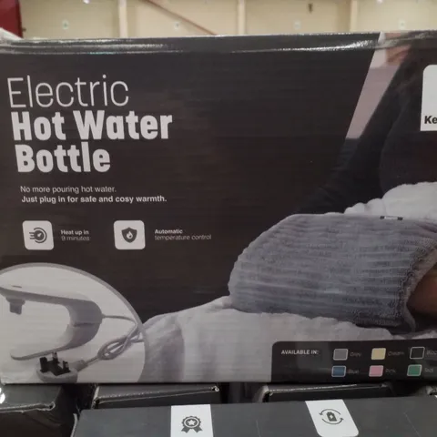 BOX CONTAINING 7 KEPLIN ELECTRIC HOT WATER BOTTLES - GREY