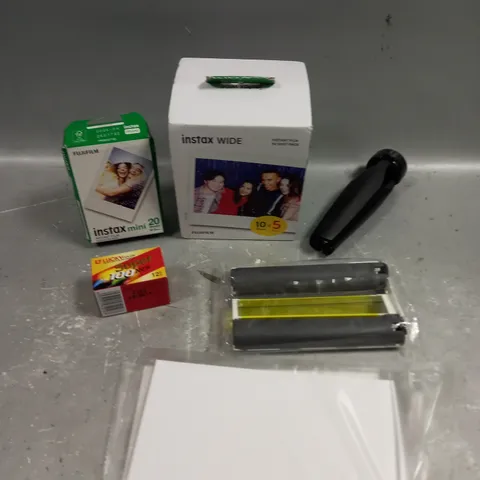 APPROXIMATELY 10 ASSORTED CAMERA ACCESSORIES TO INCLUDE PHOTO PAPER, FILM, COVER CASE ETC