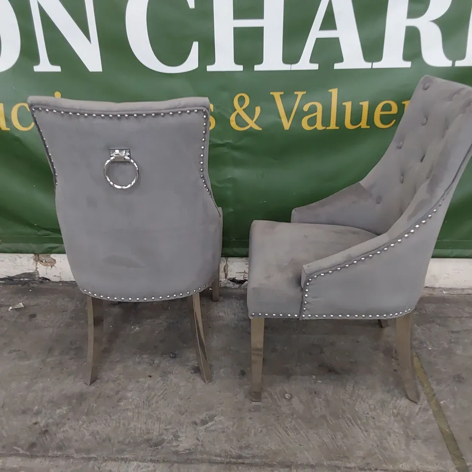PAIR OF UPHOLSTERED BUTTONED RING BACK DINING CHAIRS STUDDED DETAIL ON SILVER LEGS