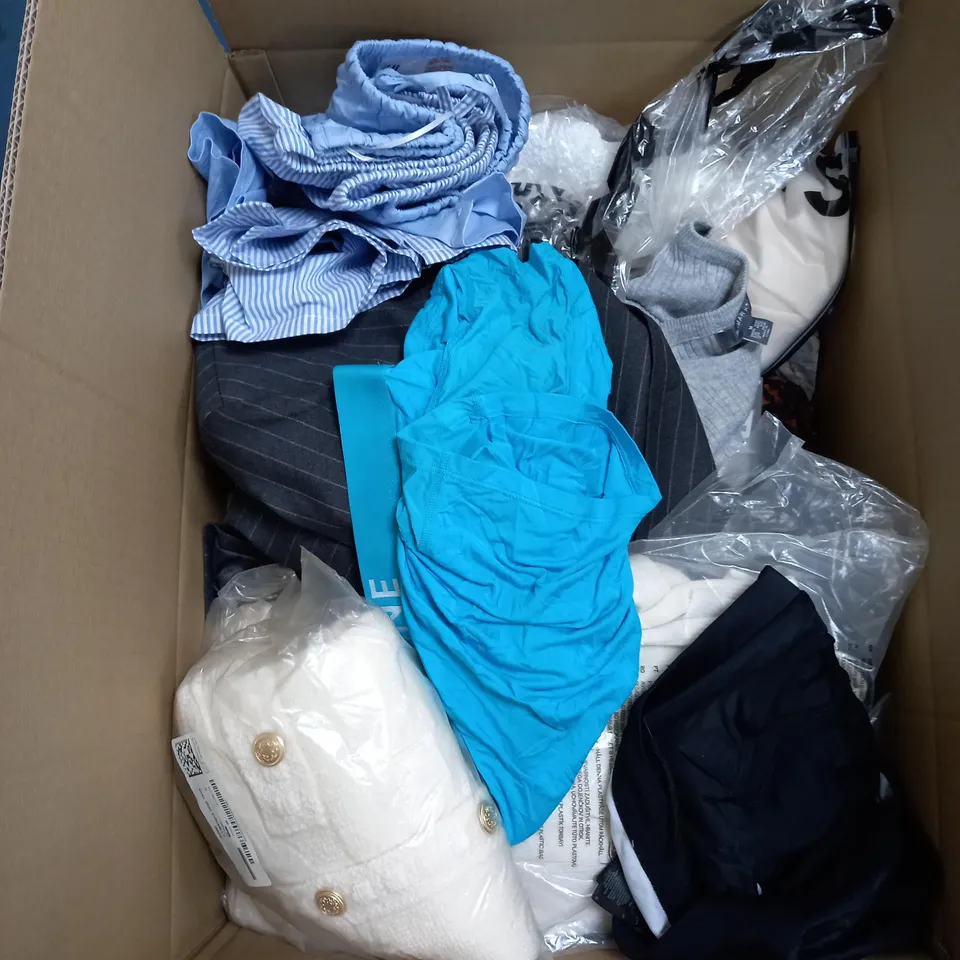 LARGE BOX OF ASSORTED CLOTHING ITEMS IN VARIOUS COLOURS AND SIZES INCLUDING TROUSERS , TOPS AND JUMPERS 