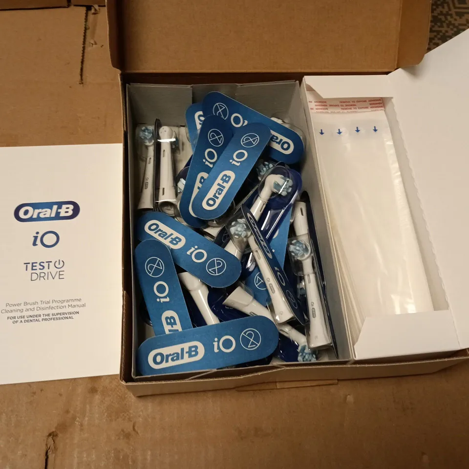 ORAL-B IO TEST DRIVE REFILL KIT – 25 BRUSH HEADS, 30 PROTECTIVE SHEATHS, INSTRUCTION MANUAL 