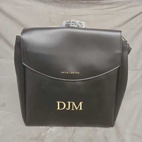 KATIE LOXTON BLACK LEATHER-LOOK CROSSBODY BAG WITH 'DJM' MONOGRAM