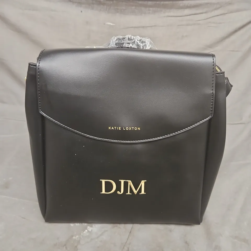KATIE LOXTON BLACK LEATHER-LOOK CROSSBODY BAG WITH 'DJM' MONOGRAM