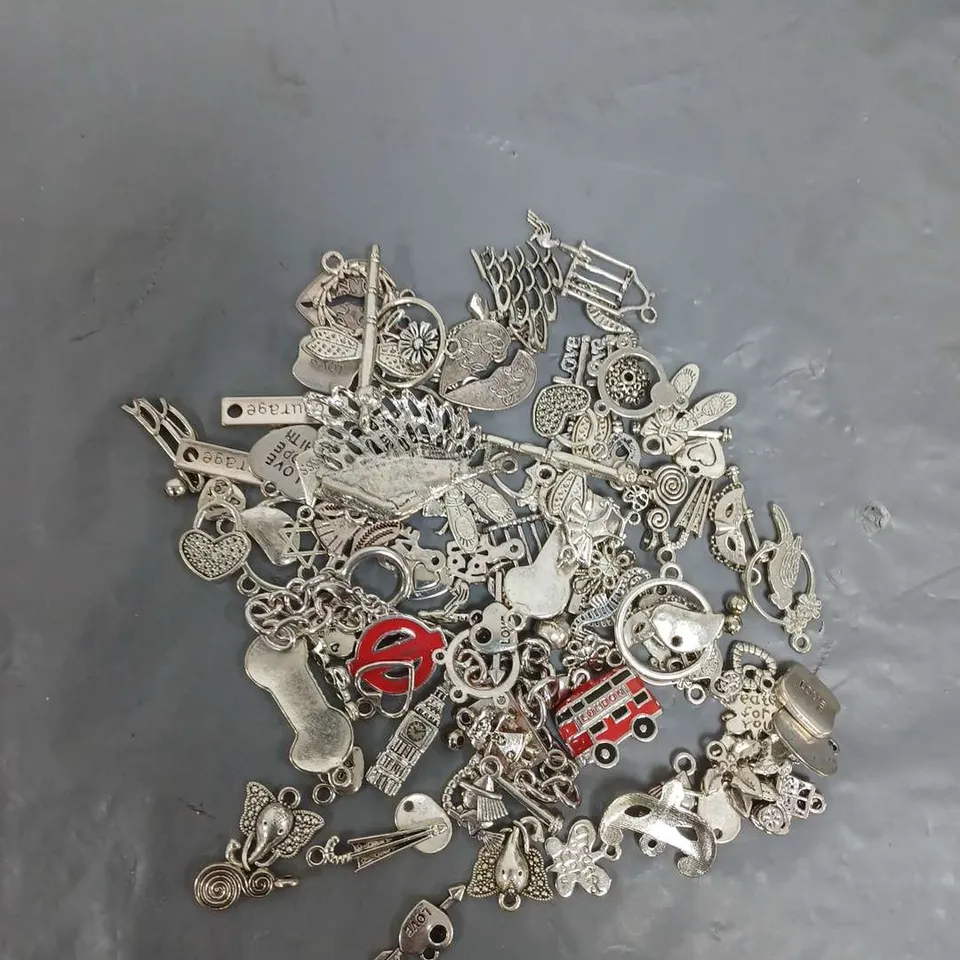 LARGE QUANTITY OF SILVER CHARMS FOR BRACELETS