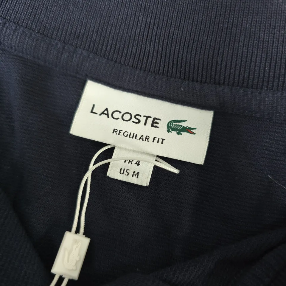 LACOSTE REGULAR FIT NAVY POLO SHIRT – MEN'S SIZE M