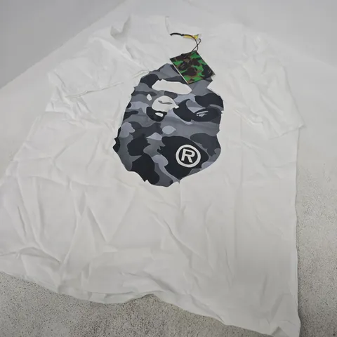A BATHING APE T-SHIRT – WHITE, CAMOUFLAGE APE LOGO, SIZE L (UK)