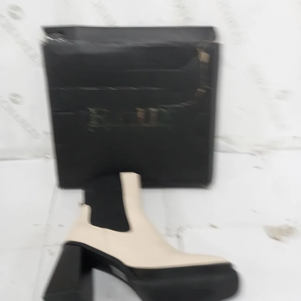 BOXED PAIR OF SLIP ON BLOCK HEEL BOOTS CREAM SIZE UK 6 