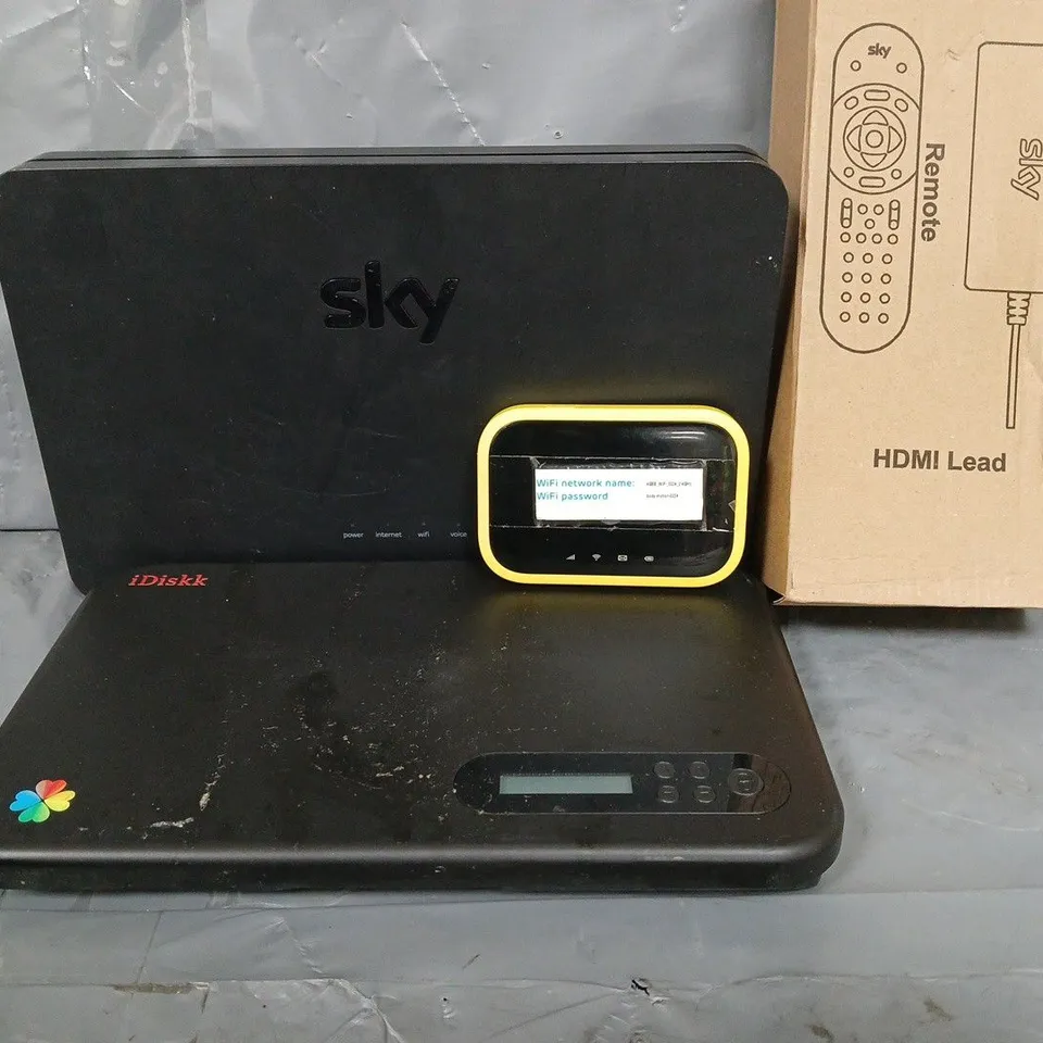 APPROXIMATELY 10 ASSORTED ITEMS TO INCLUDE - SKY HUB , HDMI LEAD ETC