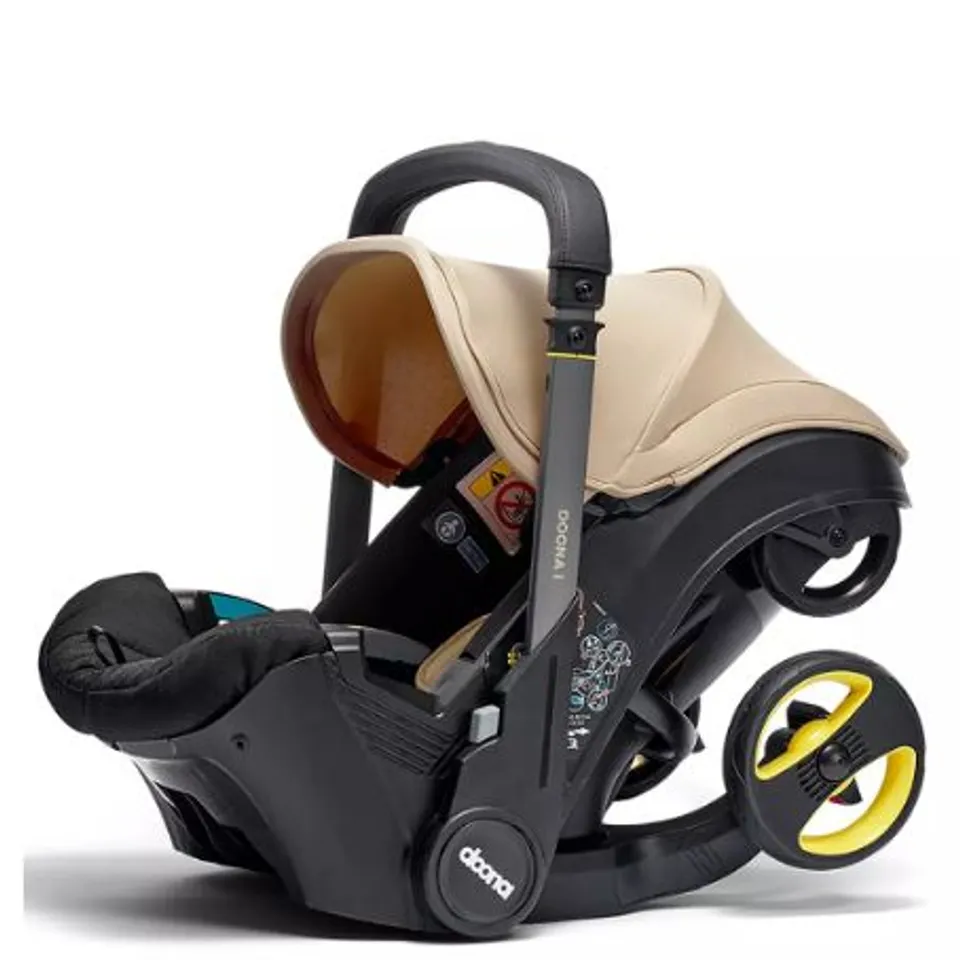 DOONA DOONA-I INFANT CAR SEAT & STROLLER - SAHARA SAND - COLLECTION ONLY 