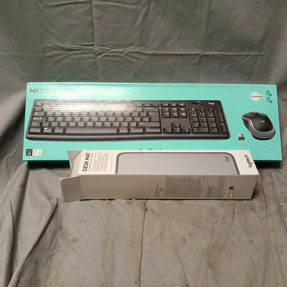 BOX OF APPROXIMATELY 20 ASSORTED COMPUTER RELATED PRODUCTS TO INCLUDE NON UK VERSION LOGITECH KEYBOARDS, LOGITECH DESK MATS ETC