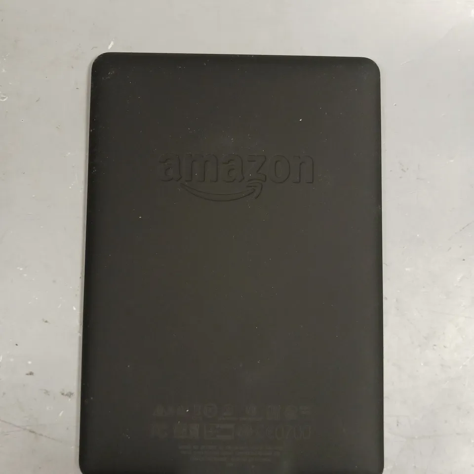 AMAZON KINDLE PAPERWEIGHT E-READER 