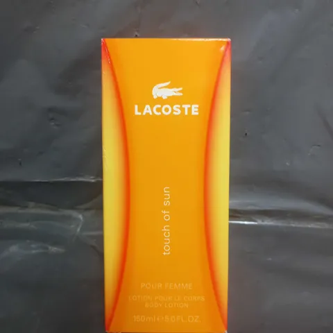 BOX OF APPROX 20 LACOSTE TOUCH OF SUN POUR FEMME BODY LOTION