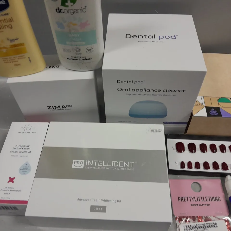 BOX OF APPROXIMATELY 10 COSMETIC ITEMS TO INCLUDE ORAL APPLIANCE CLEANER, BABY WASH , TEETH WHITENING KIT, ETC