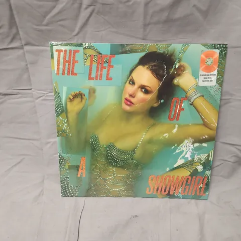 SEALED THE LIFE OF A SHOWGIRL – TAYLOR SWIFT PORTOFINO ORANGE GLITTER VINYL LP