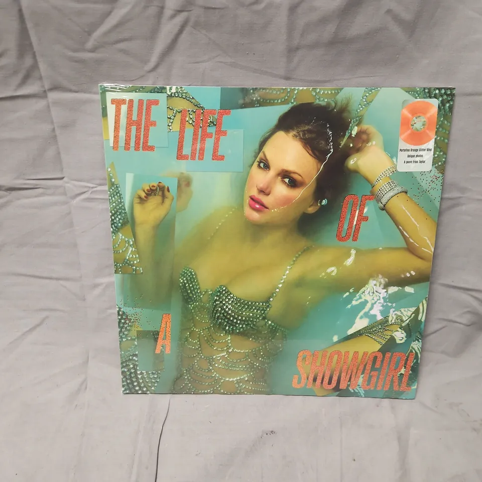 SEALED THE LIFE OF A SHOWGIRL – TAYLOR SWIFT PORTOFINO ORANGE GLITTER VINYL LP