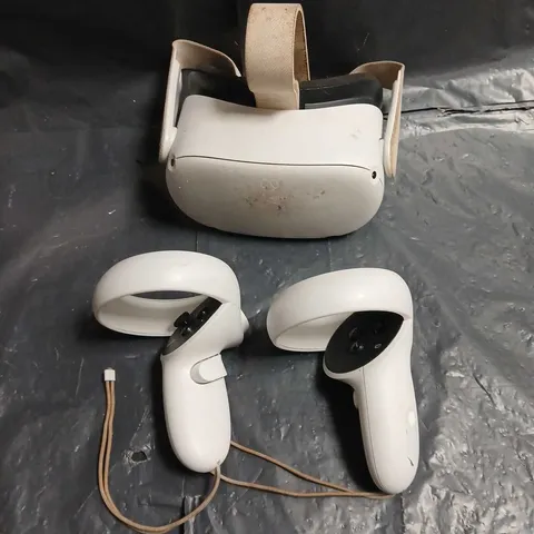 META QUEST VIRTUAL REALITY HEADSET WITH TWO MOTION CONTROLLERS