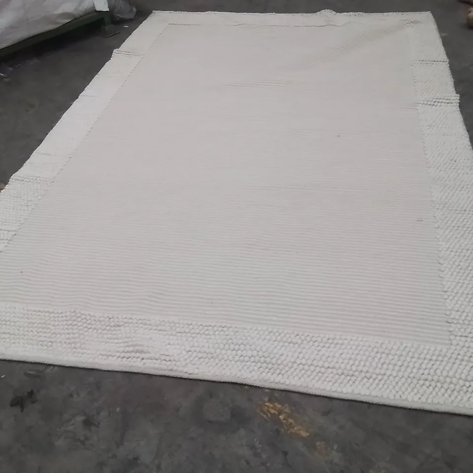 STILLAGE OF APPROXIMATELY 20 QUALITY DESIGNER RUGS