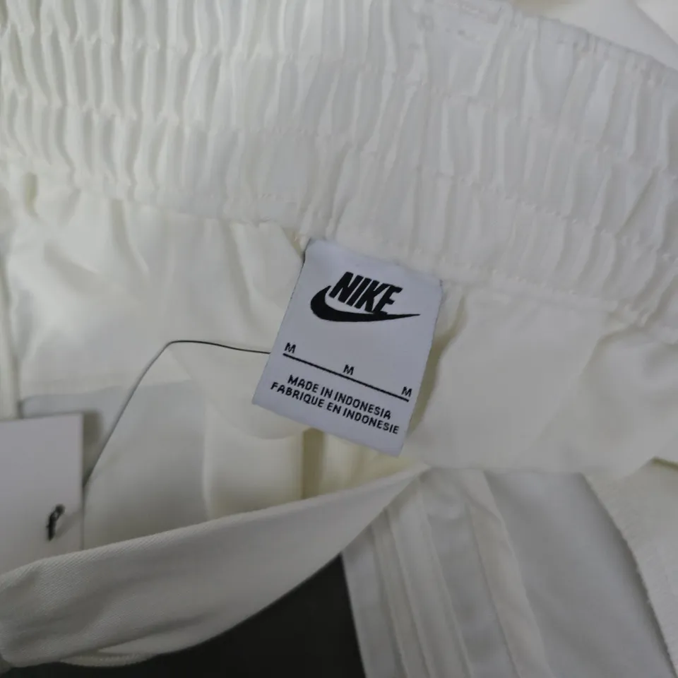 NIKE WOMENS STANDARD FIT TROUSERS IN WHITE - MEDIUM