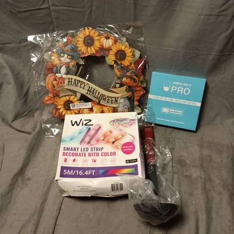 BOX OF APPROXIMATELY 20 ASSORTED HOUSEHOLD ITEMS TO INCLUDE MASK, LADLE, HAPPY HALLOWEEN SIGN, WIZ SMART LED STRIP ETC