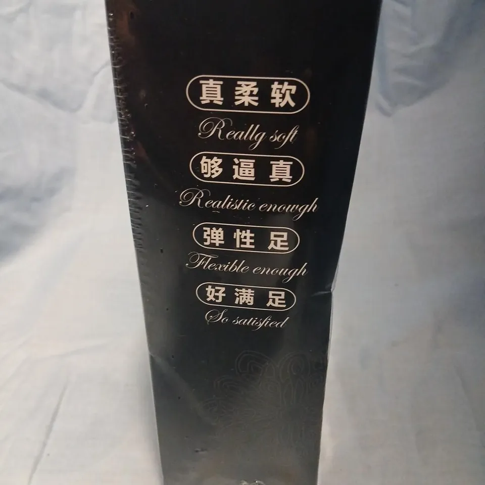 ADULT NOVELTY SEX TOY IN BLACK BOX – BILINGUAL PACKAGING WITH 'REALLY SOFT', 'FLEXIBLE ENOUGH'