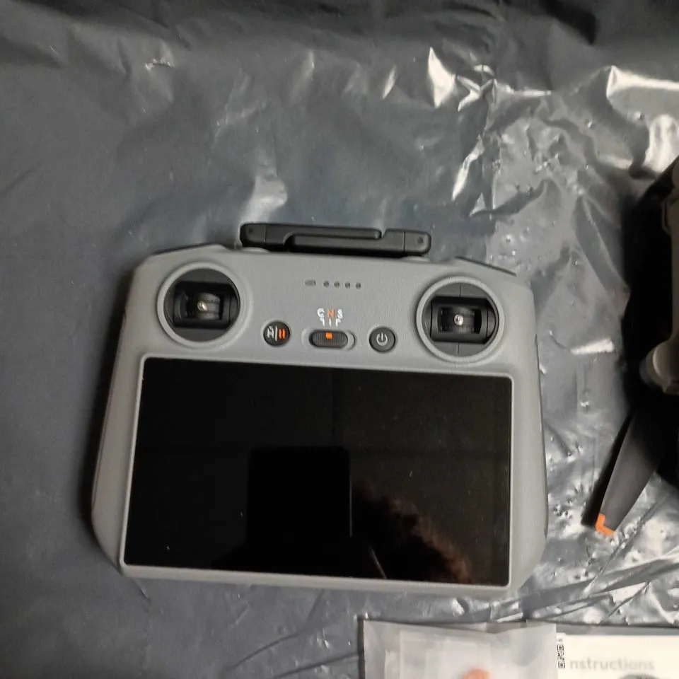 DJI Drone kit with integrated-screen controller, batteries & charger – carry case