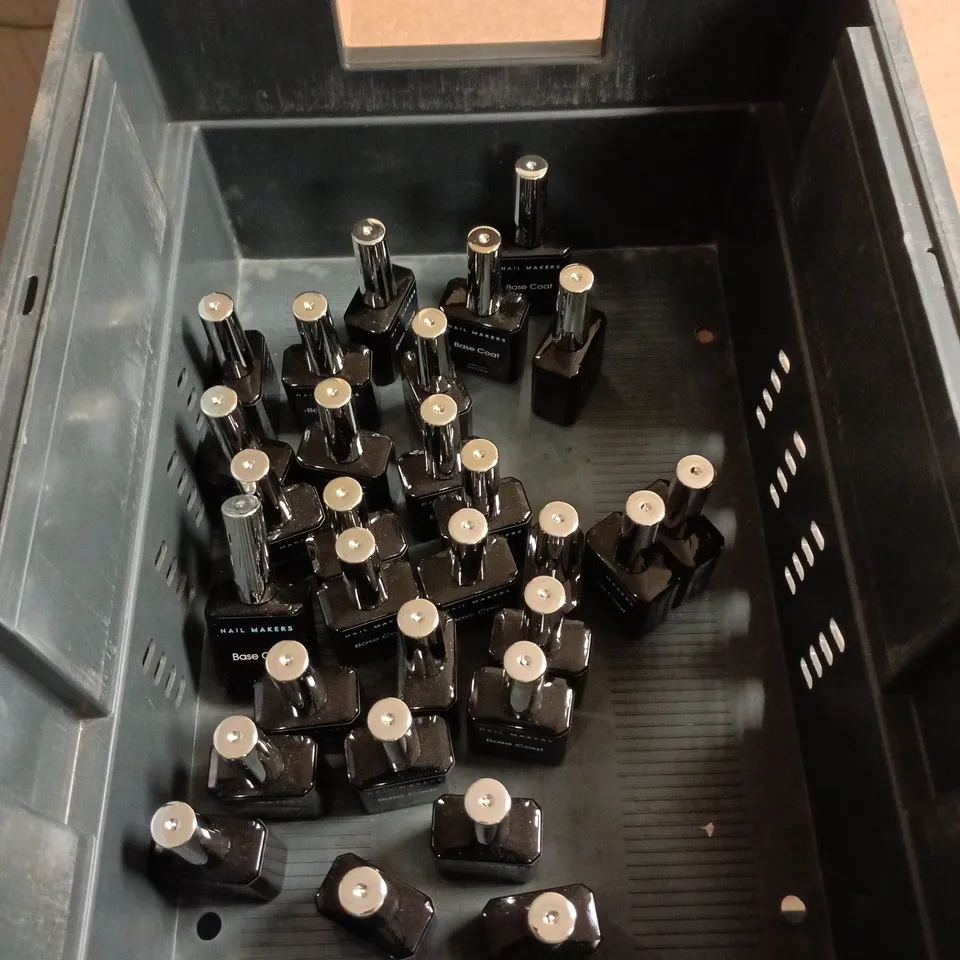 TOTE OF APPROXIMATELY 20 NAIL MAKERS TOP COATS
