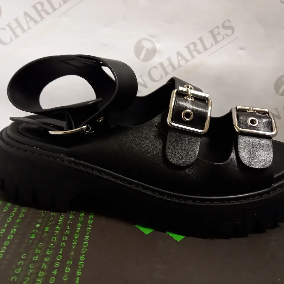 KOI VEGAN TRANTOR GLADIATOR SANDALS - BLACK SIZE 6