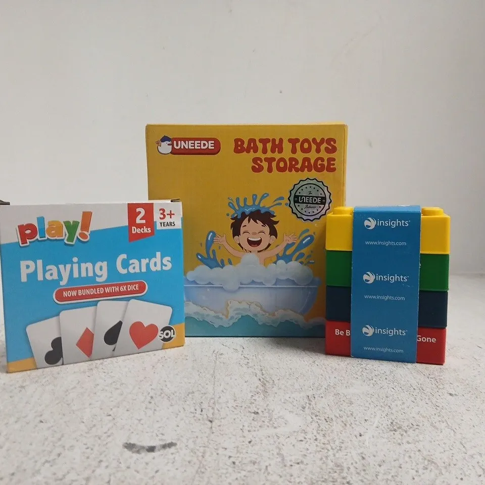 APPROXIMATELY 10 ASSORTED TOYS AND GAMES TO INCLUDE BATH TOYS STORAGE, PLAYING CARDS, ETC
