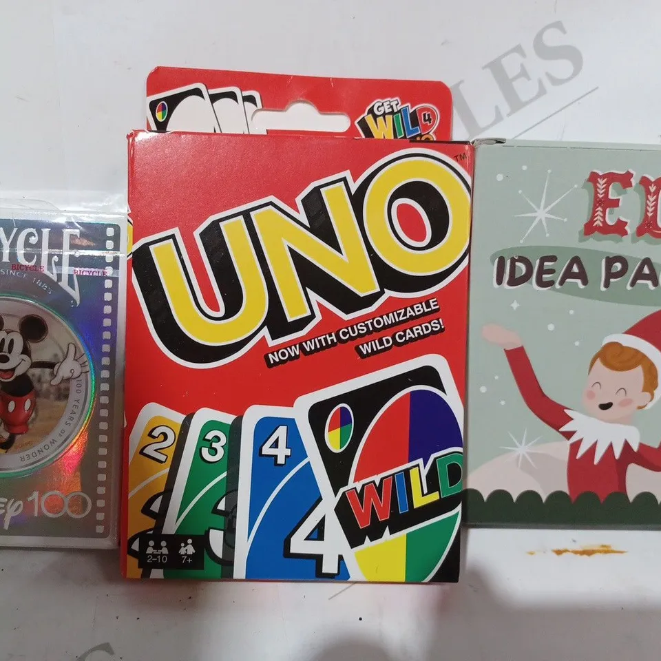 BOX OF APPROXIMATELY 10 ASSORTED TOYS AND GAMES TO INCLUDE ELF IDEA PACK, UNO, BICYCLE DISNEY100 PLAYING CARDS, ETC