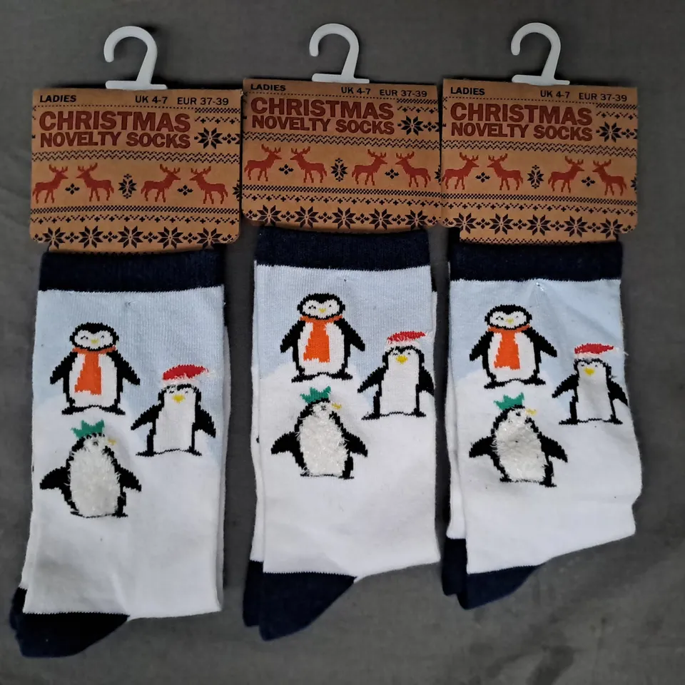 BOX OF APPROXIMATELY 20 PAIRS OF CHRISTMAS NOVELTY PENGUIN SOCKS