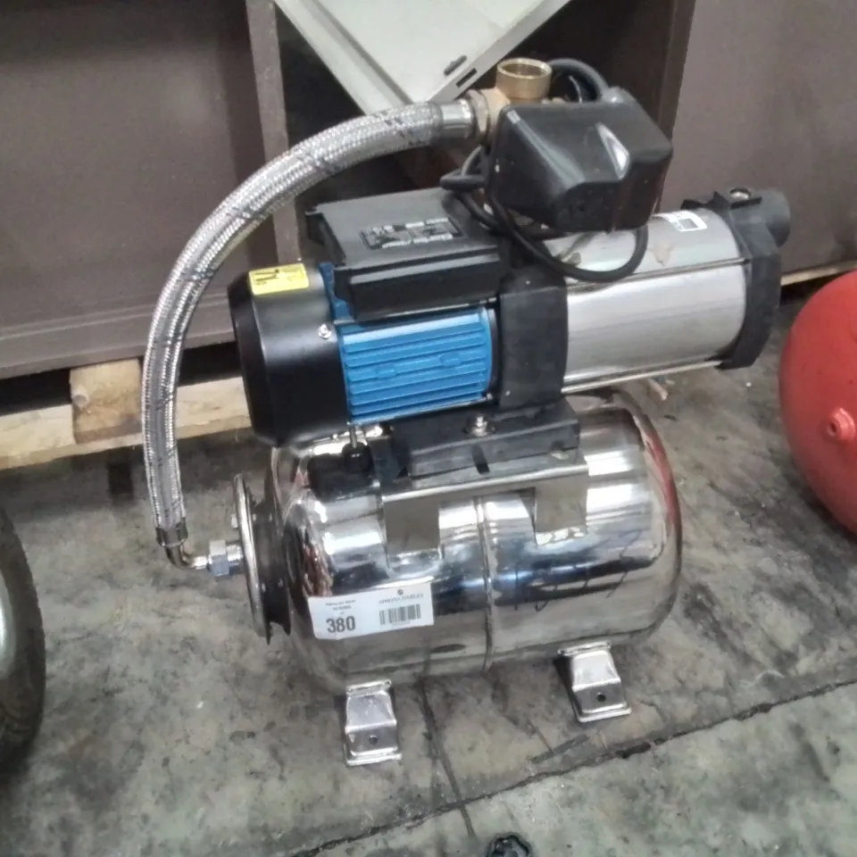 ELECTRIC WATER PUMP WITH CHROME PRESSURE TANK AND BRAIDED HOSE – USED (VERIFY MODEL)