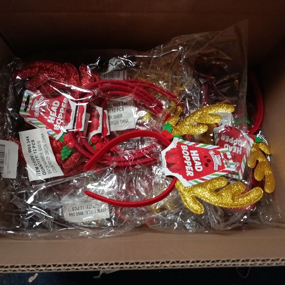 LOT OF APPROXIMATELY 70 MERRY CHRISTMAS HEAD BOPPERS