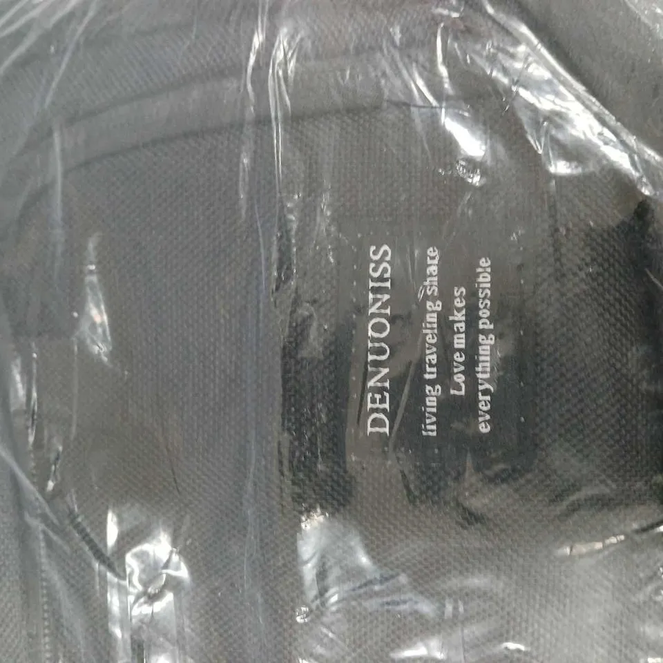 BLACK BACKPACK/BAG IN SEALED PLASTIC WRAP 